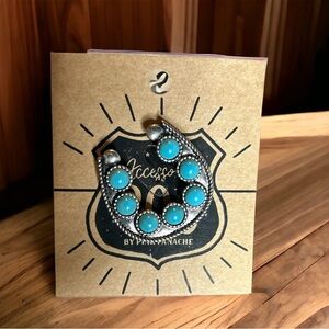 Turquoise and silver horse shoe shape stretchy ring. New from my boutique.